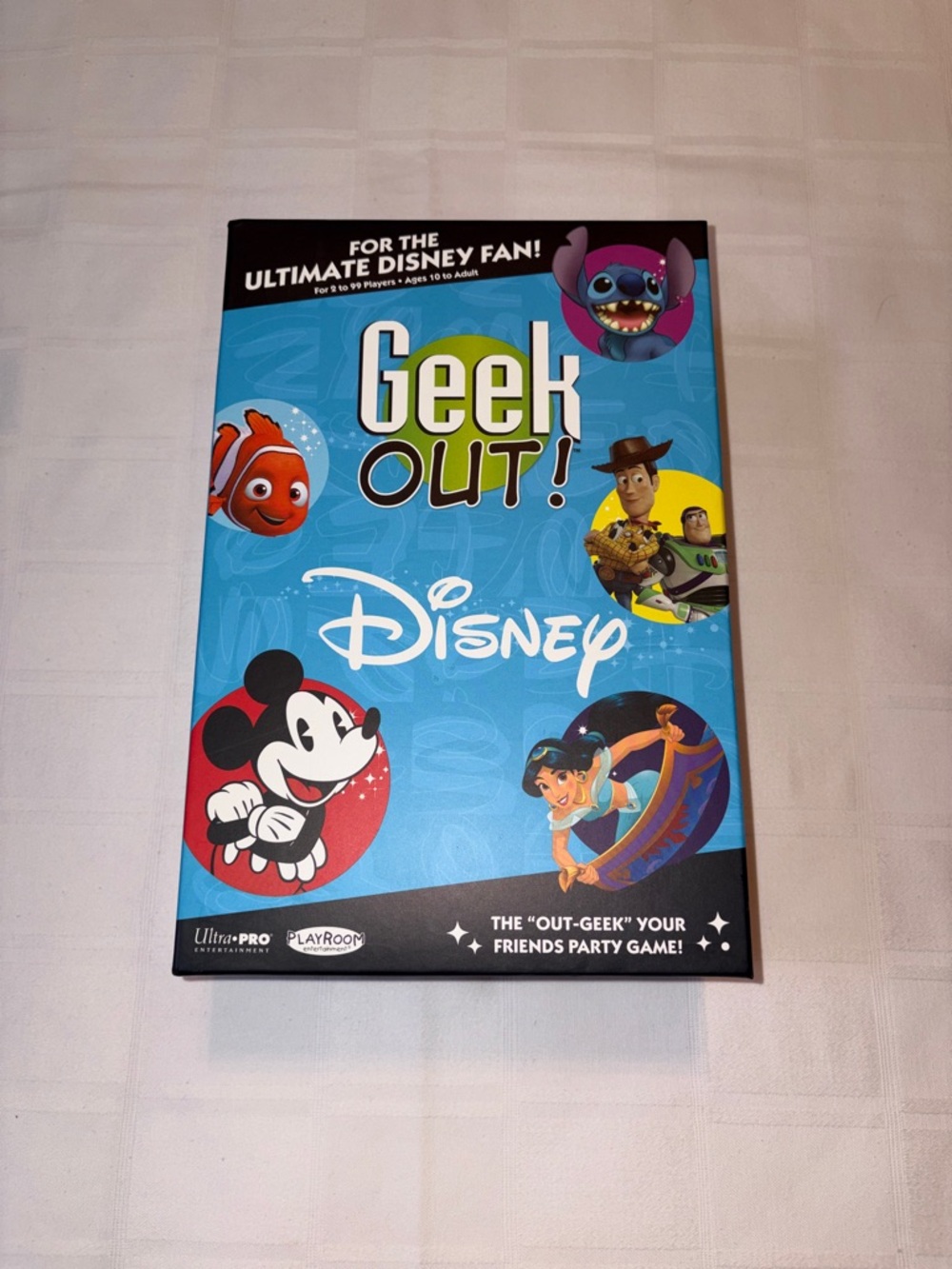 Disney Geek Out! Party Game – Bright Blue Box with Multicolor Character Art